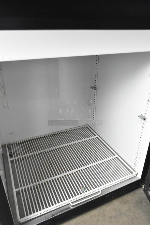 2019 True GDM-05-HC-LD mini cooler merchandiser, metal construction, 115 volts, 1 phase, interior shelving visible.