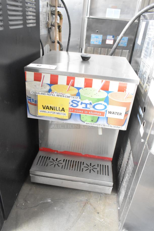 APW Wyott FC-14D stainless steel countertop beverage dispenser, 120V, 1 phase, with vanilla flavor label, used condition.