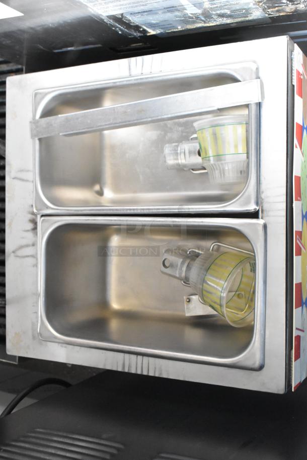 APW Wyott FC-14D stainless steel beverage dispenser, dual compartments, used condition, 120 volts, 1 phase.