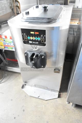 Taylor C706-27 stainless steel soft serve machine, single flavor, air cooled, 208-230V, 1 phase, visible control panel.