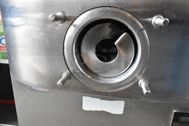 Taylor C706-27 stainless steel countertop air-cooled soft serve machine, visible spout, and secure fasteners, 208-230V, 1 phase.