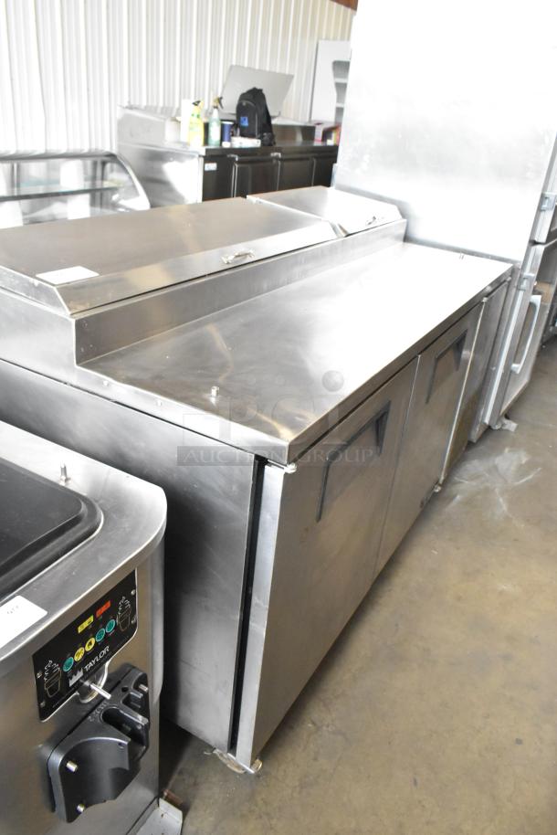 True TPP-67 Stainless Steel Pizza Prep Table, commercial casters, 115V, 1 Phase, excellent condition.