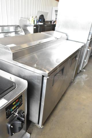 True TPP-67 Stainless Steel Pizza Prep Table, commercial casters, 115V, 1 Phase, excellent condition.