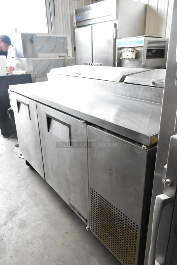 True TPP-67 Stainless Steel Commercial Pizza Prep Table on casters, 115V, 1 Phase. Used condition.