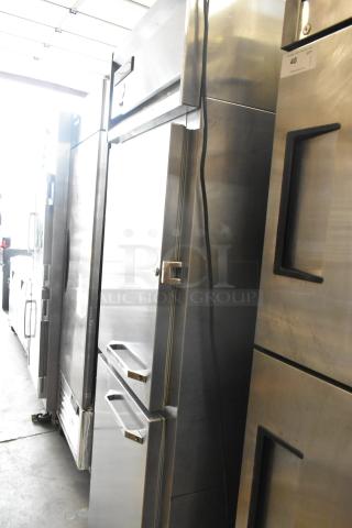 Traulsen stainless steel commercial cooler with 2 half-size doors, on casters. 115V, 1 phase, in good condition.