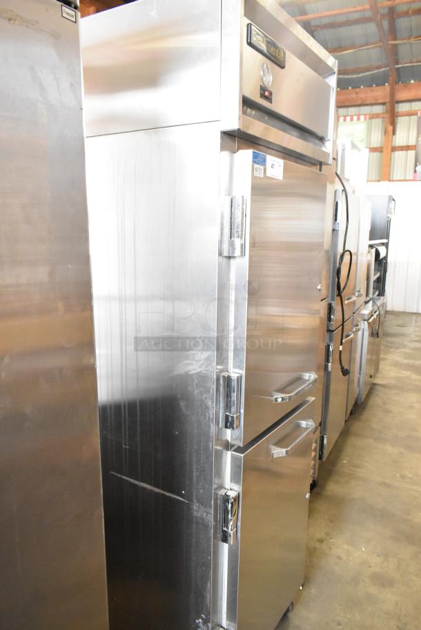 Traulsen stainless steel commercial cooler, 2 half-size doors, on casters, 115V, 1 phase. Clean condition.