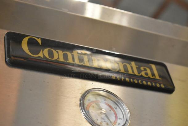 Stainless steel commercial refrigerator with thermometer and "Continental Refrigeration" label, in good condition.