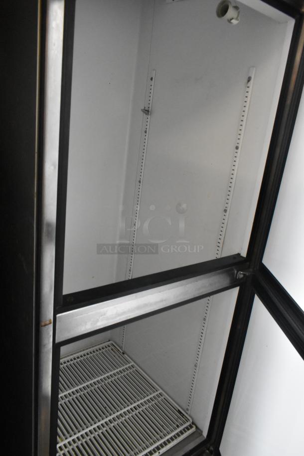 True T-23-2 stainless steel cooler, 2 half-size doors, on casters, interior shelving, 115V, 1 phase.