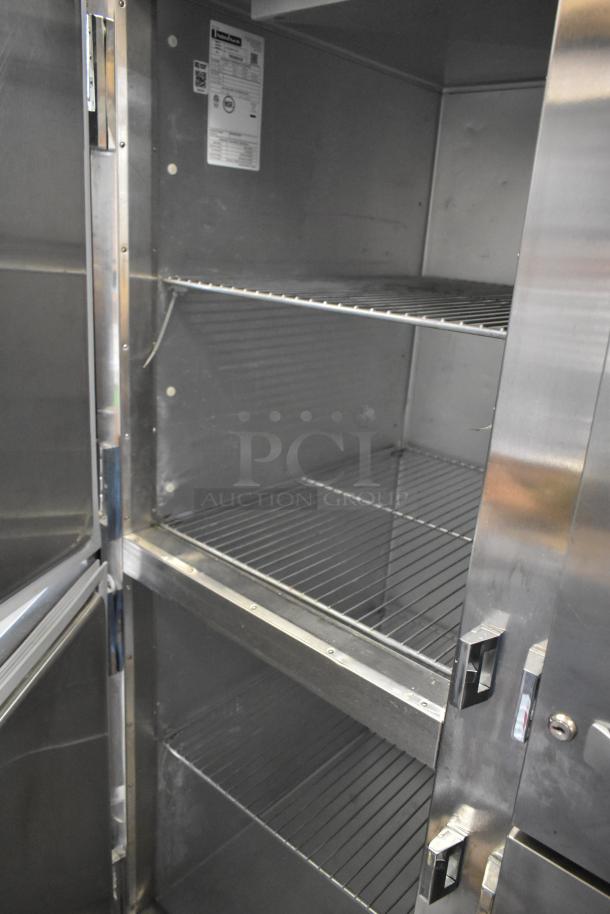 2018 Traulsen ALT232NUT-HHS stainless steel commercial cooler, four half-size doors, on casters, excellent condition, 115V.