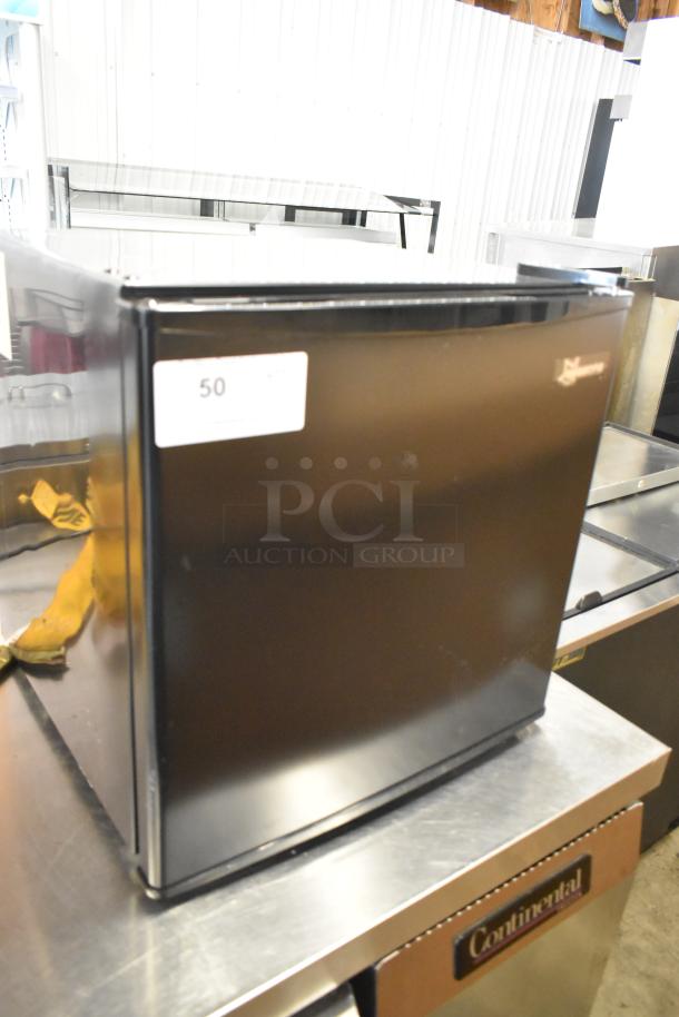 Seasons 189974 Mini Cooler in black, 115 volts, 1 phase, good condition. Visible label: "50." Suitable for compact spaces.