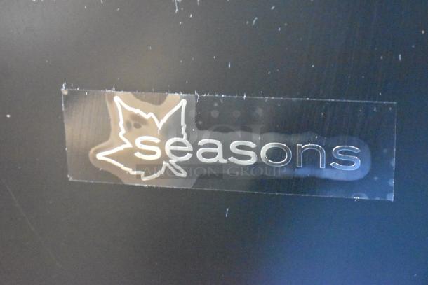 Seasons 189974 Mini Cooler logo on the unit. Black finish, 115 Volts, 1 Phase, maple leaf design. In good condition.