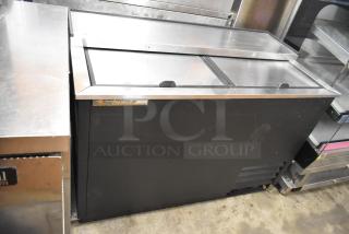 True TD-50-18 stainless steel back bar bottle cooler with 2 sliding lids, 115V, 1 phase, excellent condition.