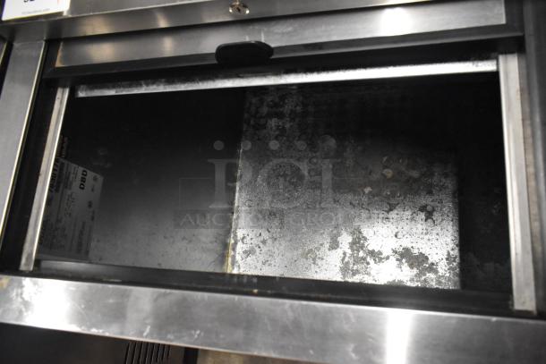 True TD-50-18 stainless steel commercial back bar cooler, two sliding lids, 115 volts, 1 phase, shows interior condition.