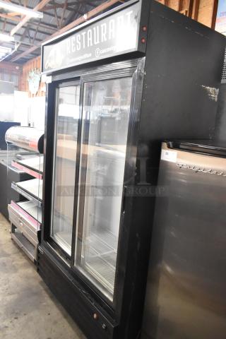 Kool It KSM-36 metal commercial 2-door reach-in cooler, poly-coated racks, 115 volts, 1 phase, visible wear.