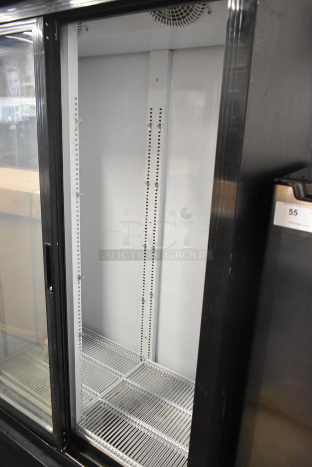 Kool It KSM-36 metal commercial 2-door reach-in cooler with poly-coated racks, 115 volts, 1 phase; clean interior.