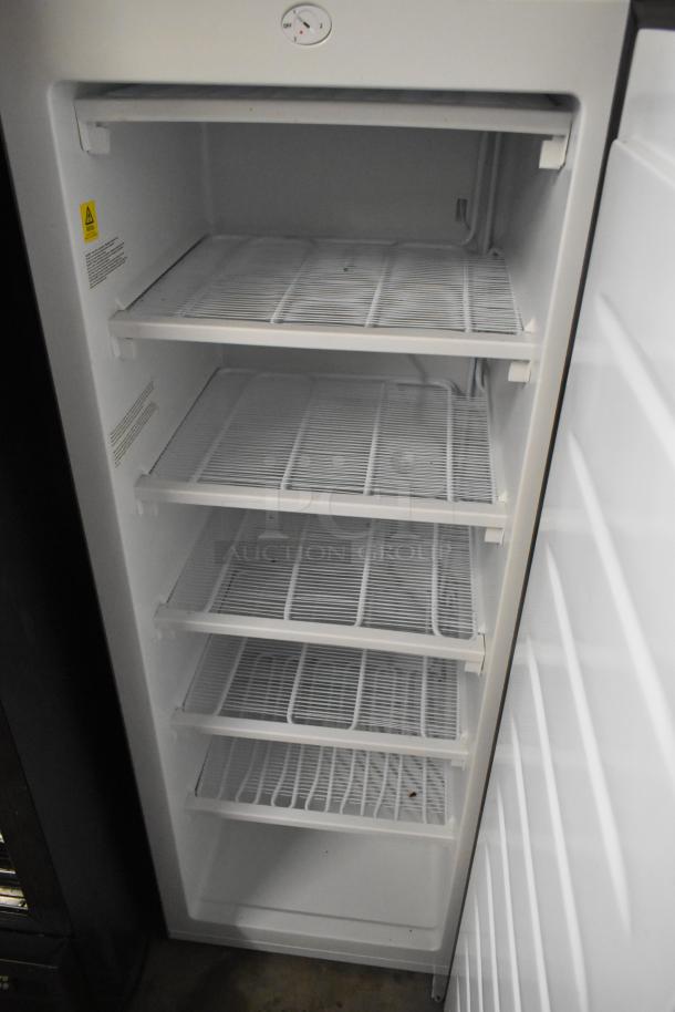 Frigidaire EFRF696-AMZ-6COM stainless steel single door reach-in freezer, 115V, 1 phase, with four wire shelves.