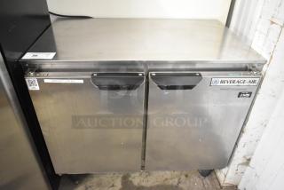 Beverage Air UCR34Y stainless steel 2-door undercounter cooler on commercial casters, 115V, with visible brand label.