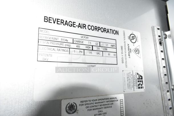 Beverage Air UCR34Y cooler label showing model, refrigerant type, design pressure, and electrical ratings.