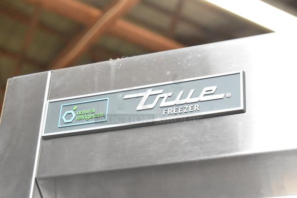 2024 True T-19F-HC stainless steel commercial freezer, natural refrigerant label. Single door, poly-coated racks, on casters.