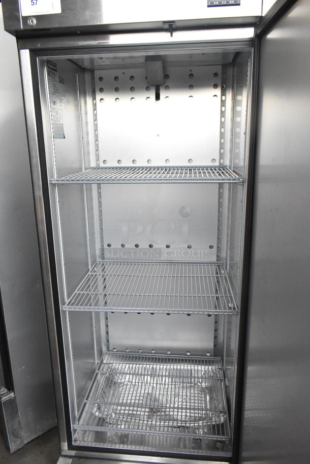 2024 True T-19F-HC stainless steel freezer, single door, poly-coated racks, commercial casters, 115V, excellent condition.