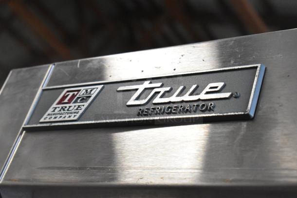 2017 True T-35 stainless steel 2-door commercial cooler label, features poly racks, on casters, 115V, 1 phase.