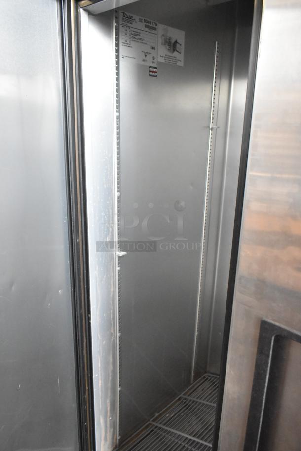 2017 True T-35 stainless steel 2-door cooler with poly-coated racks, commercial casters, and 115V 1-phase power. Model label visible.