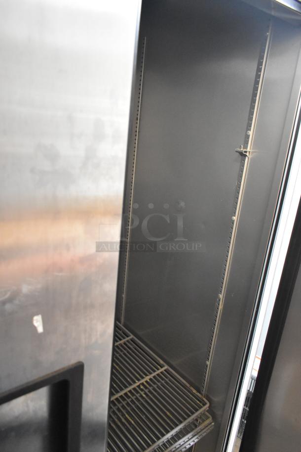 2017 True T-35 stainless steel commercial 2-door reach-in cooler, poly coated racks, commercial casters, 115V, 1 phase.
