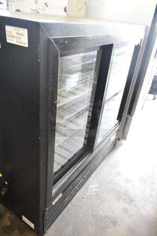 Imbera VRD41 commercial cooler, metal frame, two glass doors, poly-coated racks. 115V, 1 Phase. Clean and good condition.