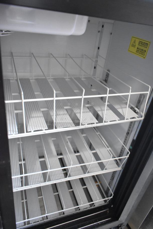 Imbera VRD41 metal 2-door reach-in cooler with poly-coated racks, 115 volts, 1 phase. Visible load warning label.