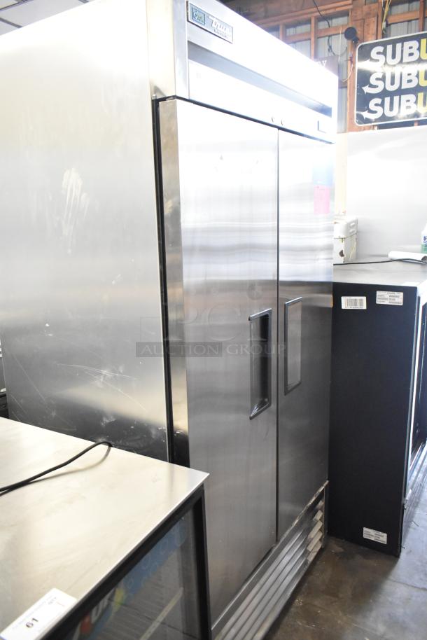 2021 True T-35-HC stainless steel 2-door commercial cooler with poly coated racks. Model T-35-HC, 115V, 1 phase. Excellent condition.