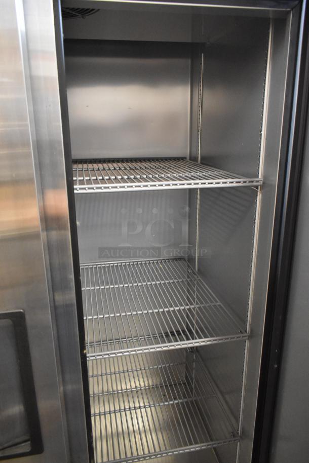 2021 True T-35-HC stainless steel 2-door reach-in cooler, features poly-coated racks, 115 volts, 1 phase, commercial grade.