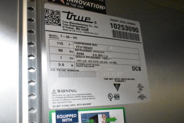2021 True T-35-HC stainless steel commercial cooler label, showing model, voltage, and refrigerant details.