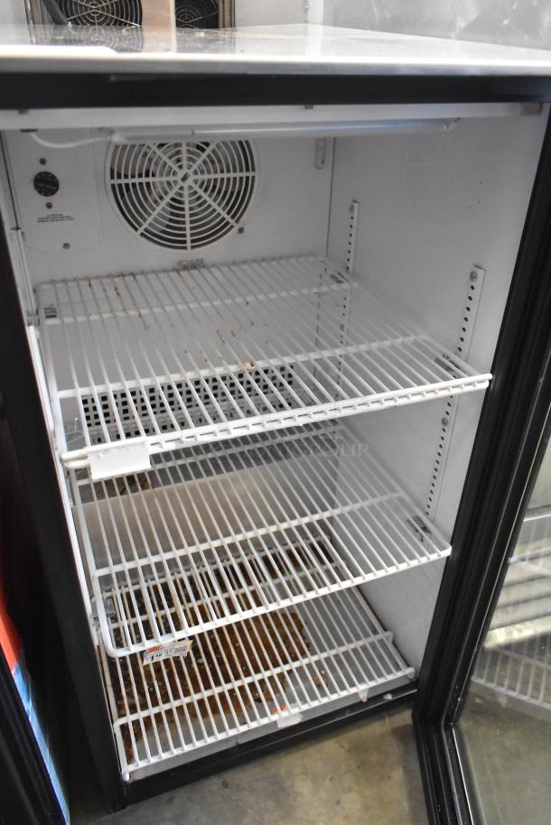 True GDM-06-LD mini cooler merchandiser, metal, single glass door, white interior, poly coated racks, 115V, 1 phase, good condition.