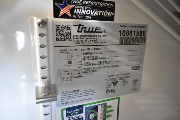 2024 True GDM-12-HC commercial mini cooler label, showing model, voltage, and refrigerant details. Serial number visible.