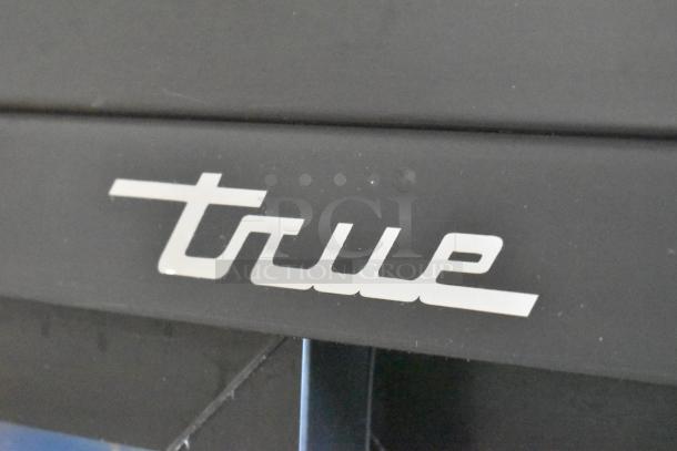True logo on 2022 GDM-41SL-60-HC-LD Commercial 2 Door Mini Cooler, 115V, black finish, indicating make and brand.
