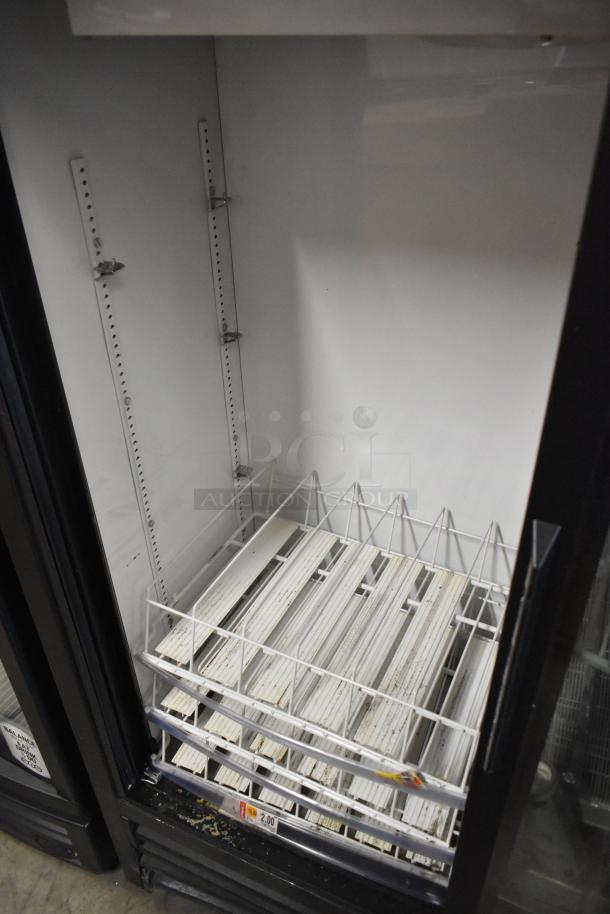 True GDM-41SL-60-HC-LD metal commercial mini cooler with two doors and poly-coated racks, 115 volts, 1 phase.