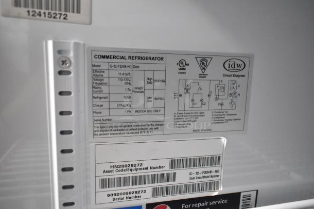 IDW G-12-F334B-HC commercial cooler label detailing model, voltage (115V, 1 phase), effective volume, and refrigerant type.