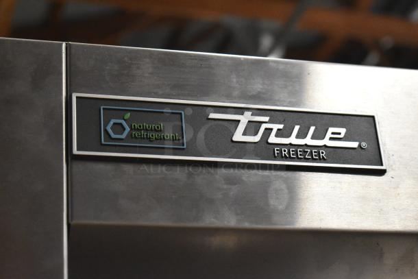 2022 True T-19F-HC freezer, stainless steel, single door, with natural refrigerant logo, poly-coated racks, excellent condition.