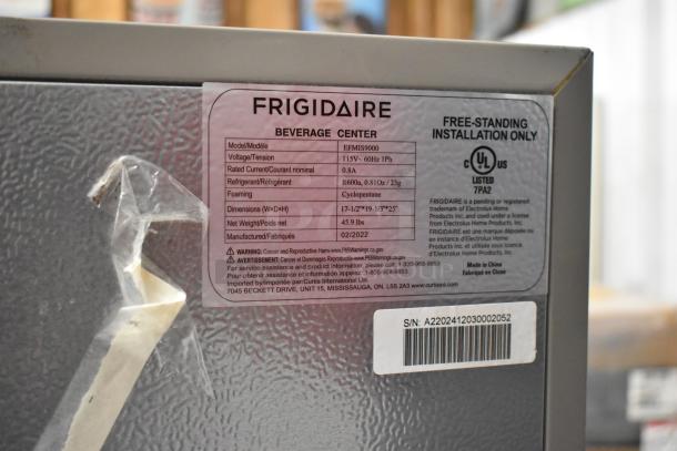 2022 Frigidaire EFMIS9000 Metal Mini Cooler, 115V, 1 Phase, with labeled spec sheet showing dimensions and refrigerant type.