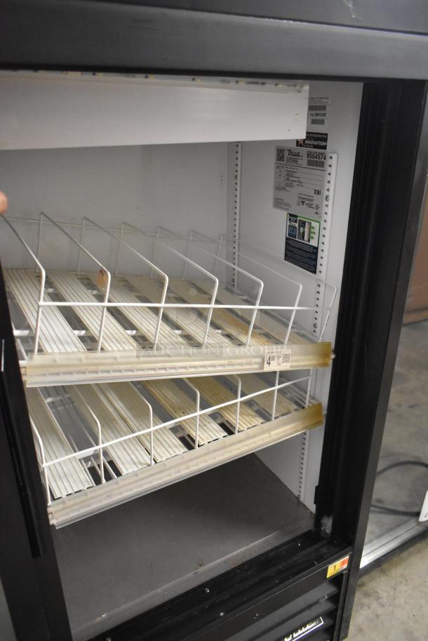 2019 True GDM-41SL-48-HC-LD 2-door cooler with poly-coated racks, 115V, 1 Phase, clean interior, visible model label.