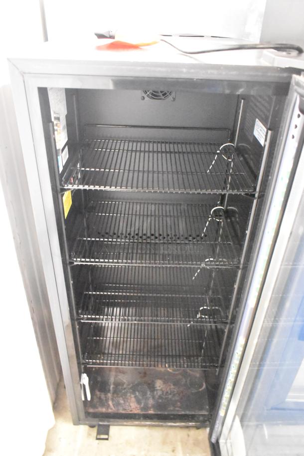 2020 IDW G4-H0234B metal single door reach-in cooler merchandiser with shelves, 115 volts, 1 phase, in good condition.