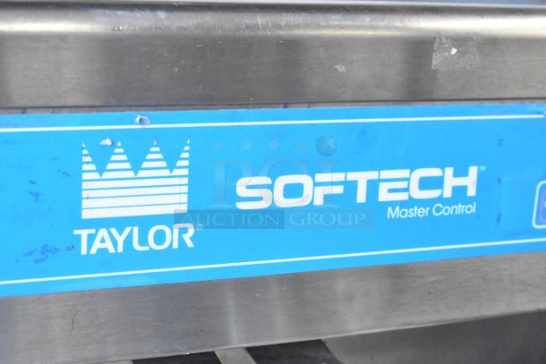 Taylor 754-27 stainless steel soft serve ice cream machine, 2 flavors with twist, on commercial casters, 208-230V, 1 phase.
