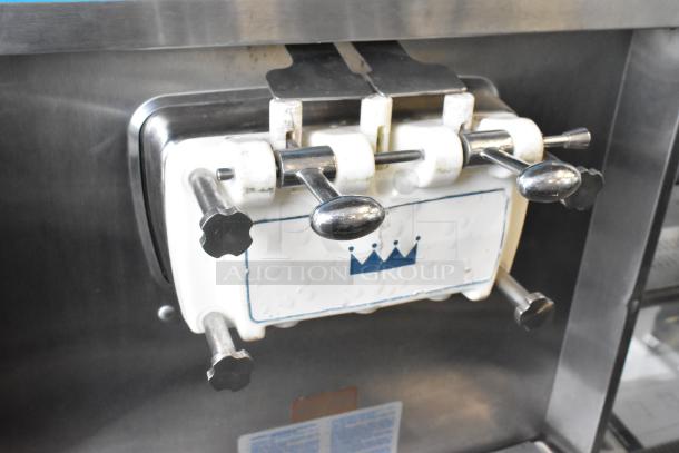 Taylor 754-27 stainless steel soft serve machine, 2-flavor with twist, commercial casters, 208-230V, 1-phase.