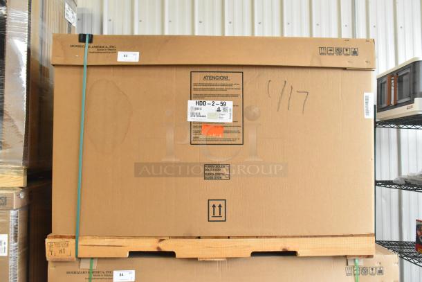 Brand new Hoshizaki HDD-2-59 kegerator in box. Labels show model, 115V, 1 phase. Securely packaged on a pallet.