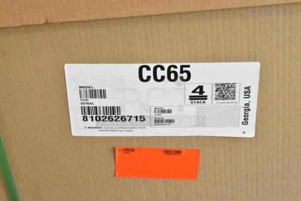 Brand new Hoshizaki CC65 back bar bottle cooler in box, model CC65, 115V, 1 Phase, with barcode and warning labels.