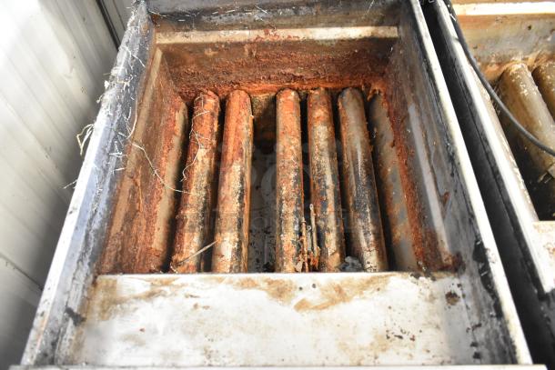 Pitco Frialator SSH75 deep fat fryer interior with visible rust and wear; stainless steel; 105,000 BTU; on casters.