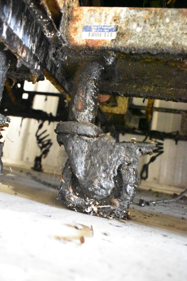 Pitco Frialator SSH75 fryer on casters, showing worn condition with visible grime and debris. Tag partially visible.