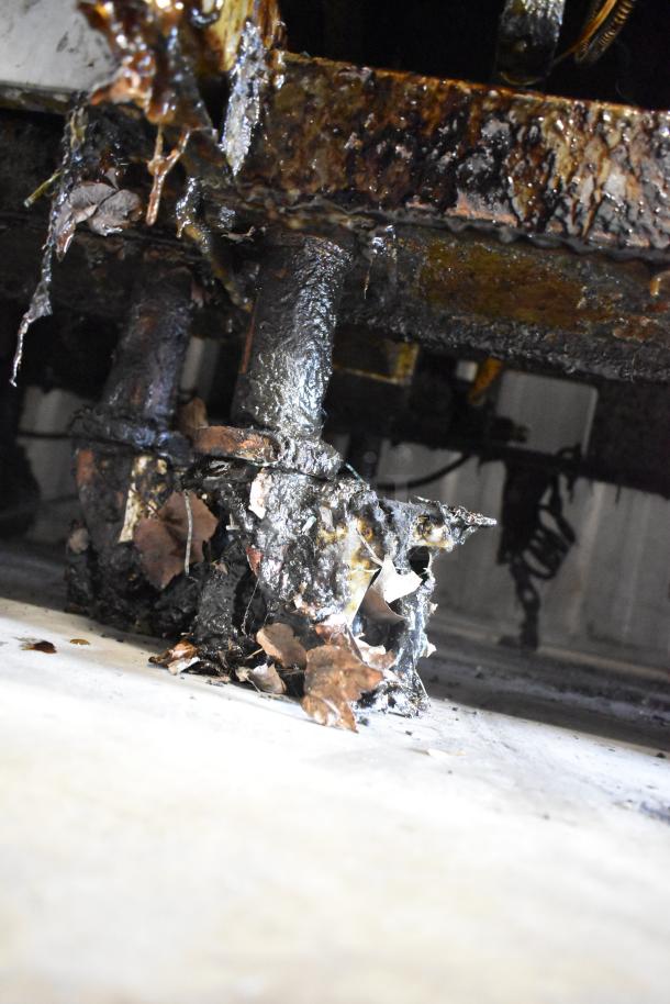 Pitco Frialator SSH75 fryer in poor condition, showing rust and residue buildup; natural gas-powered, on commercial casters.