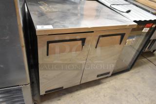 True TUC-36 stainless steel undercounter cooler, 2 doors, on casters, 115V, 1 phase, commercial use, mildly worn.