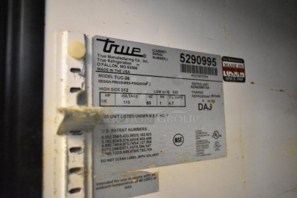 True TUC-36 undercounter cooler label showing model number, voltage 115V, phase 1. Made in USA.